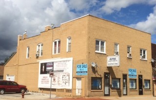 Fully leased Mixed Use Building (2 retail / 3 apartments) on Ruby Street in Joliet